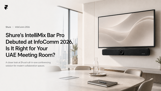 Shure IntelliMix Bar Pro mounted below a display in a UAE meeting room, from InfoComm 2026