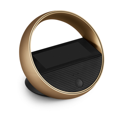 Beoremote Halo in Gold Tone on a table stand